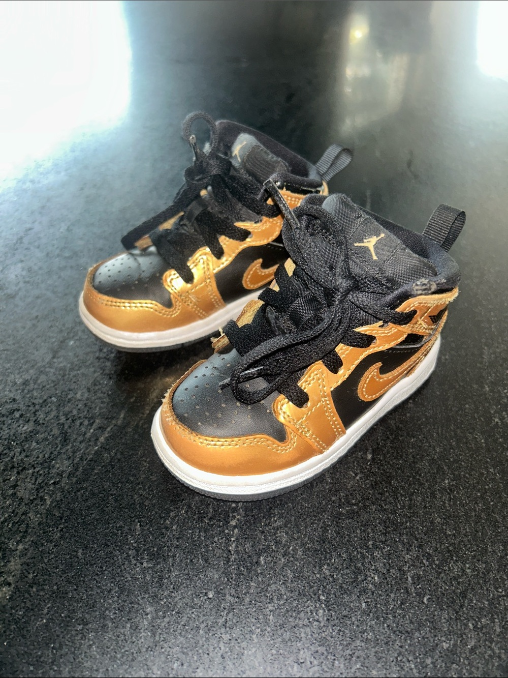 Nike Kids High-Top Sneakers in Black and Metallic Gold